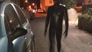 the-return-of-the-‘gimp-man’:-creepy-figure-in-latex-suit-terrorises-villagers