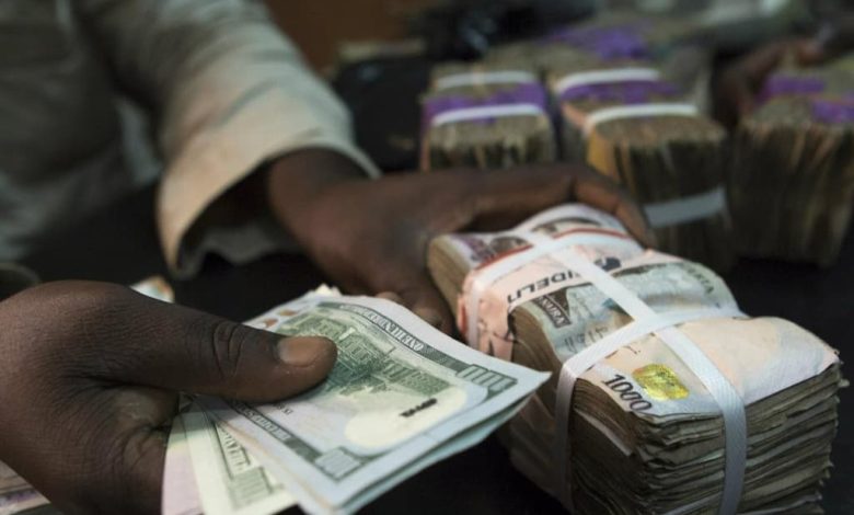 naira-loses-against-dollar-at-official,-parallel-markets