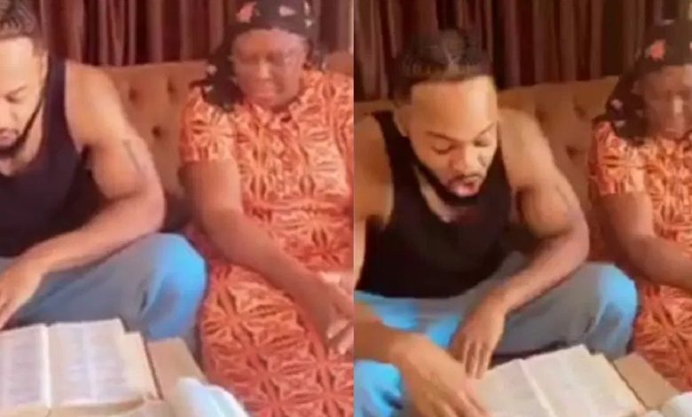 singer,-flavour-warms-hearts-with-video-of-him-reading-bible-verse-to-his-mum-during-devotion-(watch)