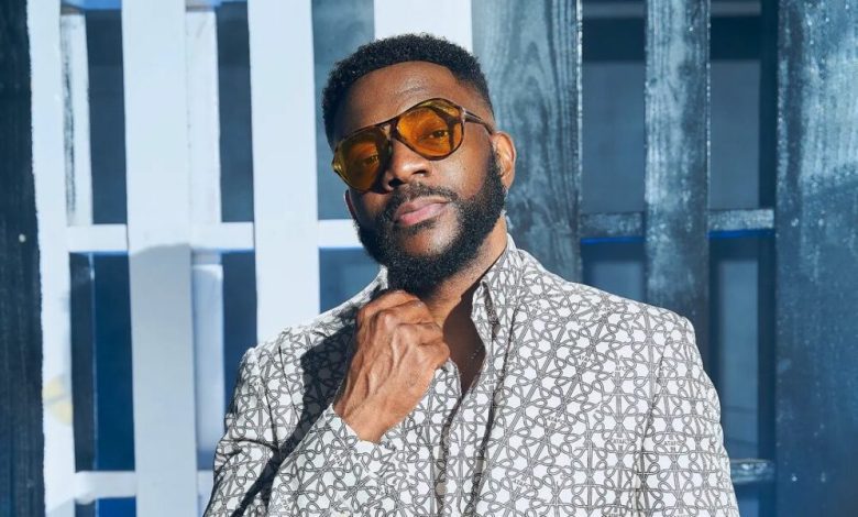 #bbtitans:-ebuka-obi-uchendu-shines-in-every-way-in-this-atafo-logo-print-suit