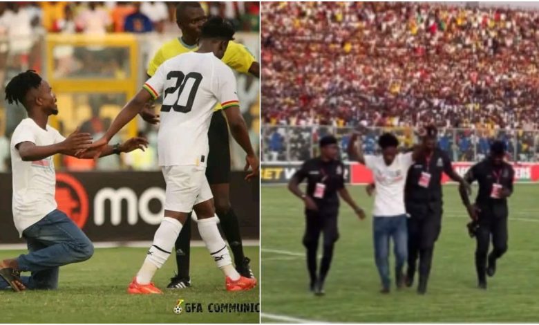 pitch-invader-taken-away-by-police-during-ghana-vs-angola-game-(video)