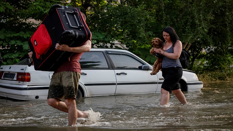 residents-flee-in-southern-ukraine-as-floodwaters-crest-from-destroyed-dam